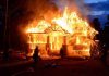 Fishing Town OBLITERATED – 170 Homes Gone Within Hours! House engulfed in flames with firefighters present.