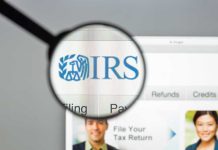 IRS Scandal Magnet Gets Top Job – He’s In! Magnifying glass over IRS website.
