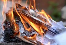 Tax Bonfire ERUPTS – City Hall Stunned Burning papers with flames and smoke rising