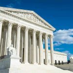 SCOTUS Hands State HUGE Win – Could Control Congress Forever Building with columns under a blue sky.