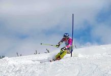 World Cup Skier’s SHOCKING Comeback at 41 Athlete skiing down a snowy slope around a slalom pole