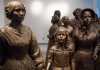Bronze sculptures of women and children in historical attire