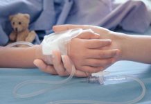 MASSIVE Hospital Reversal SHOCKS Progressive State Childs hand with IV, held by adult.