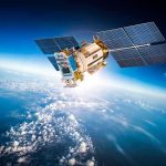 SpaceX Satellite’s 300,000 Collisions CRISIS Satellite orbiting Earth with moon in background.