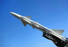 U.S. Army missile against a clear blue sky.