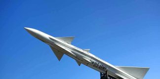 U.S. Army missile against a clear blue sky.