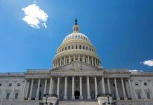 Police FORCED To Sue Congress U.S. Capitol building against a clear blue sky.