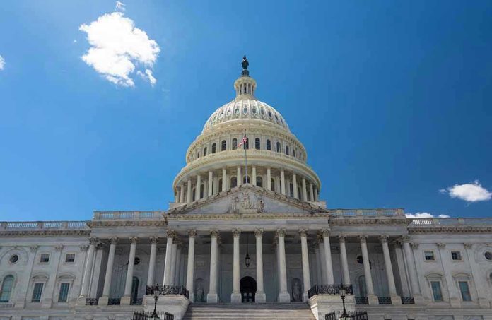 1925399747 U.S. Capitol building against a clear blue sky.