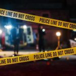 Brazen Attack on Undercover Cop SHOCKS D.C. Yellow police tape in front of crime scene.