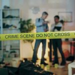 Comedy Club Owner’s TWISTED Revenge Plot Crime scene with tape and investigators examining evidence.