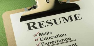 A resume checklist on a clipboard highlighting skills, education, experience, and employment