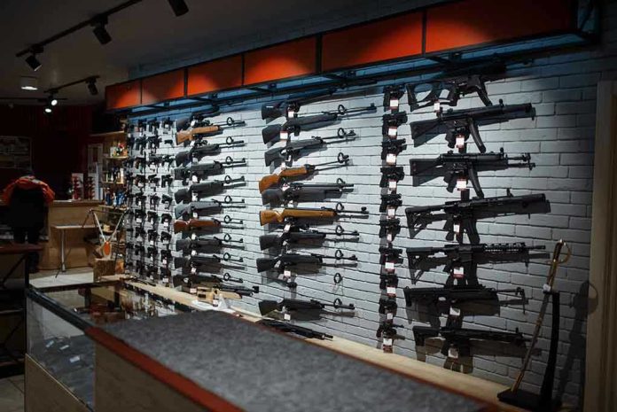 1668328855 Wall display of various rifles in a gun store.