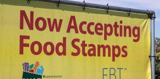 Millionaires DRAINING Food Stamps — Loophole EXPOSED! Yellow sign now accepting food stamps EBT SNAP