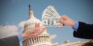 FBI Dawn RAID Backfires—$1 Million Payout Hands exchanging money in front of Capitol building.