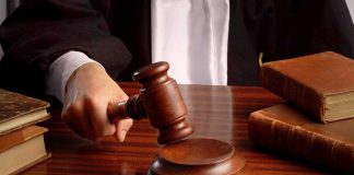 Juries FORCE Big Tech Censorship Judges gavel on desk with books.