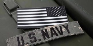 Navy Removes Humans From Minefield U.S. Navy patch with black-and-white American flag.