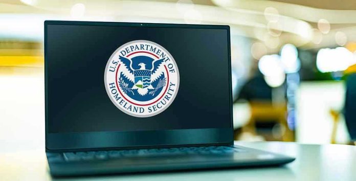 Laptop displaying U.S. Department of Homeland Security logo.