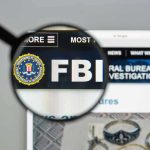 FBI Director: Terror Sleeper Cells REAL in America FBI website shown through magnifying glass.