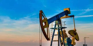 Director Drops Oil BOMBSHELL—Damage Cannot Be Undone An oil pump jack operating against a sunset backdrop