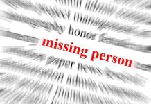 Text graphic highlighting missing person in red among blurred words