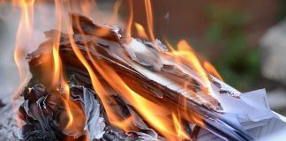 89 KILLED in Single Day — Ceasefire SHATTERED Burning papers with flames and smoke rising