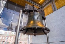 The Liberty Bell displayed in a modern museum setting