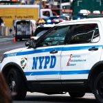 5 Year-Old Girl SHOT In Bronx Gang Crossfire NYPD police car on a city street scene.