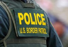 Police U.S. Border Patrol uniform close-up.