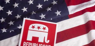 AI Smear War – Massie’s Reputation on the Line Republican symbol on American flag background.