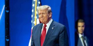 Trump’s Pastor Bro WITHDRAWS From Race After Scandal! Man in suit next to American flag.