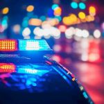 Journalist KIDNAPPED – Midnight Attack Stuns! Police car with flashing lights at night.