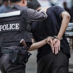 Man With Multiple Arrests STABS Pregnant Woman! Police officer arrests handcuffed person.