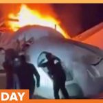 Video: Bystanders Race Toward Plane Wreckage to Free Survivors