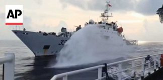China Coast Guard fires water cannon at Philippines ship in South China Sea