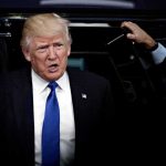 Hollywood Star Makes Sickening Trump Prediction Hand pointing at brain scan images on screen.