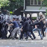 Police ATTACKED During World Cup Chaos Protesters clash with riot police holding shields