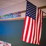American flag hanging in a classroom