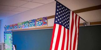 American flag hanging in a classroom