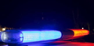 Hollywood Casting Call Predator Exposed Police car light bar flashing blue and red at night