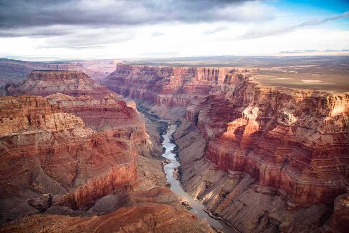 shutterstock_652472320 Grand Canyon with river winding through layered red cliffs