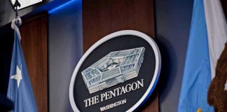 Generals Axed: Hegseth Drops the Hammer The Pentagon emblem between two flags.