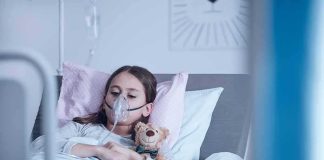 Child Euthanasia CLEARED – Toddler DEAD Child in hospital bed with oxygen mask holding teddy bear