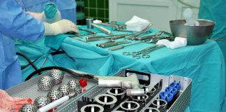 Surgical instruments and implants on a covered operating table