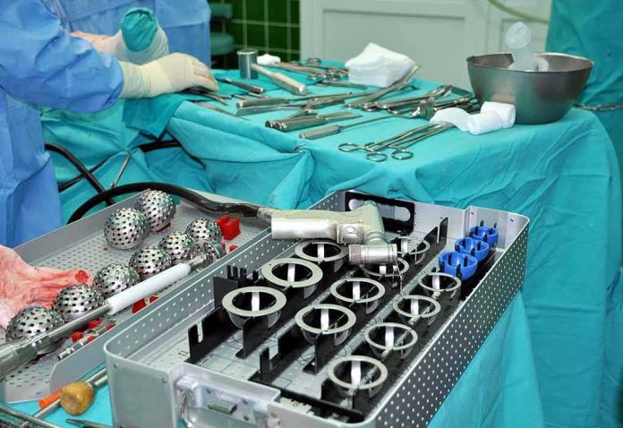 shutterstock_1171880107 Surgical instruments and implants on a covered operating table