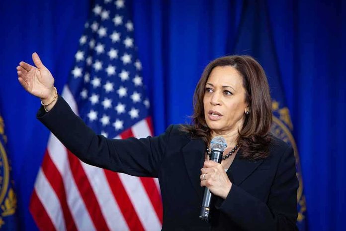 Kamala Harris speaking with microphone and gesturing on stage