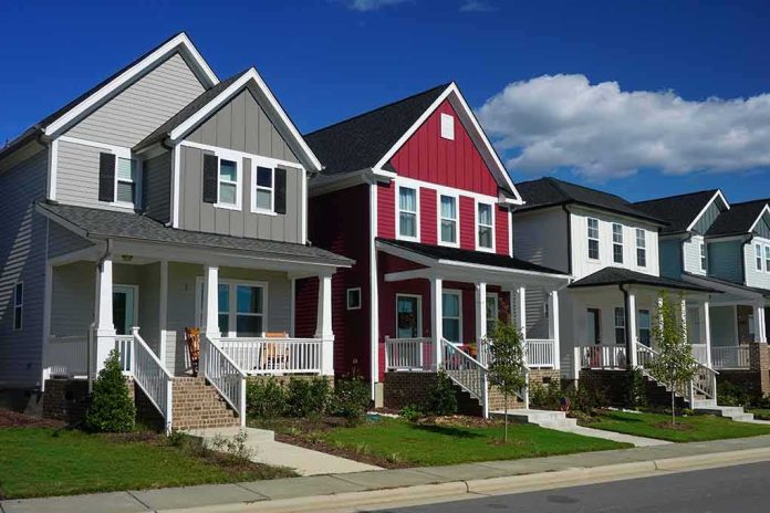 Row of modern suburban houses with front porches