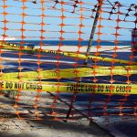 3 STABBED – Beach Bloodbath Chaos! Orange safety net and yellow police tape blocking a beach access