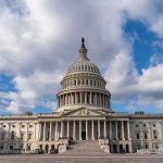 Court Brawl Brewing – Senator Drops A-Bomb! United States Capitol building under a partly cloudy sky