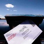 USPS Worker ARRESTED – Ballots in Dumpster Mail-in ballot being inserted into a blue USPS mailbox