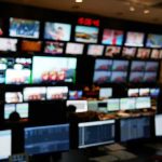 FAA Glitch Grounds ALL Flights! control room with multiple screens and monitors